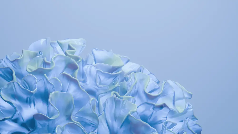 A composition of undulating elements resembling flower petals or seaweed. Each petal is rendered in a translucent blue shade with a textural effect that creates a sense of volume. The background is light, muted, emphasizing the details of the composition.